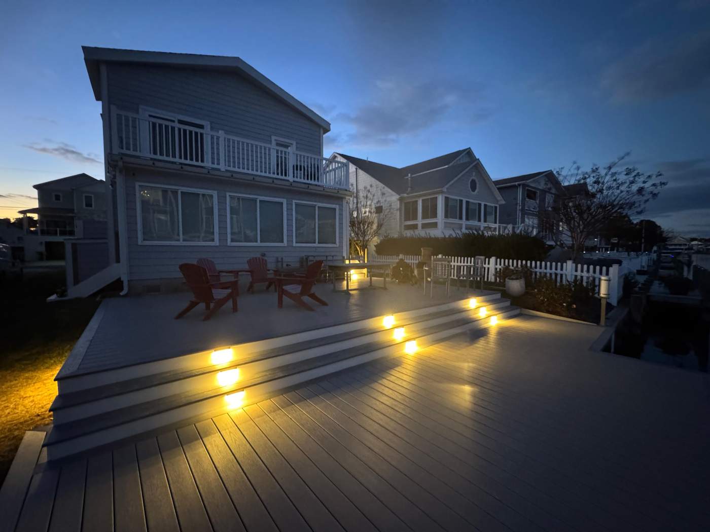 bethany-beach-deck-builder–construction-delmarva.jpg Custom deck built in South Bethany, on a canal with step lights, Delmarva Decking