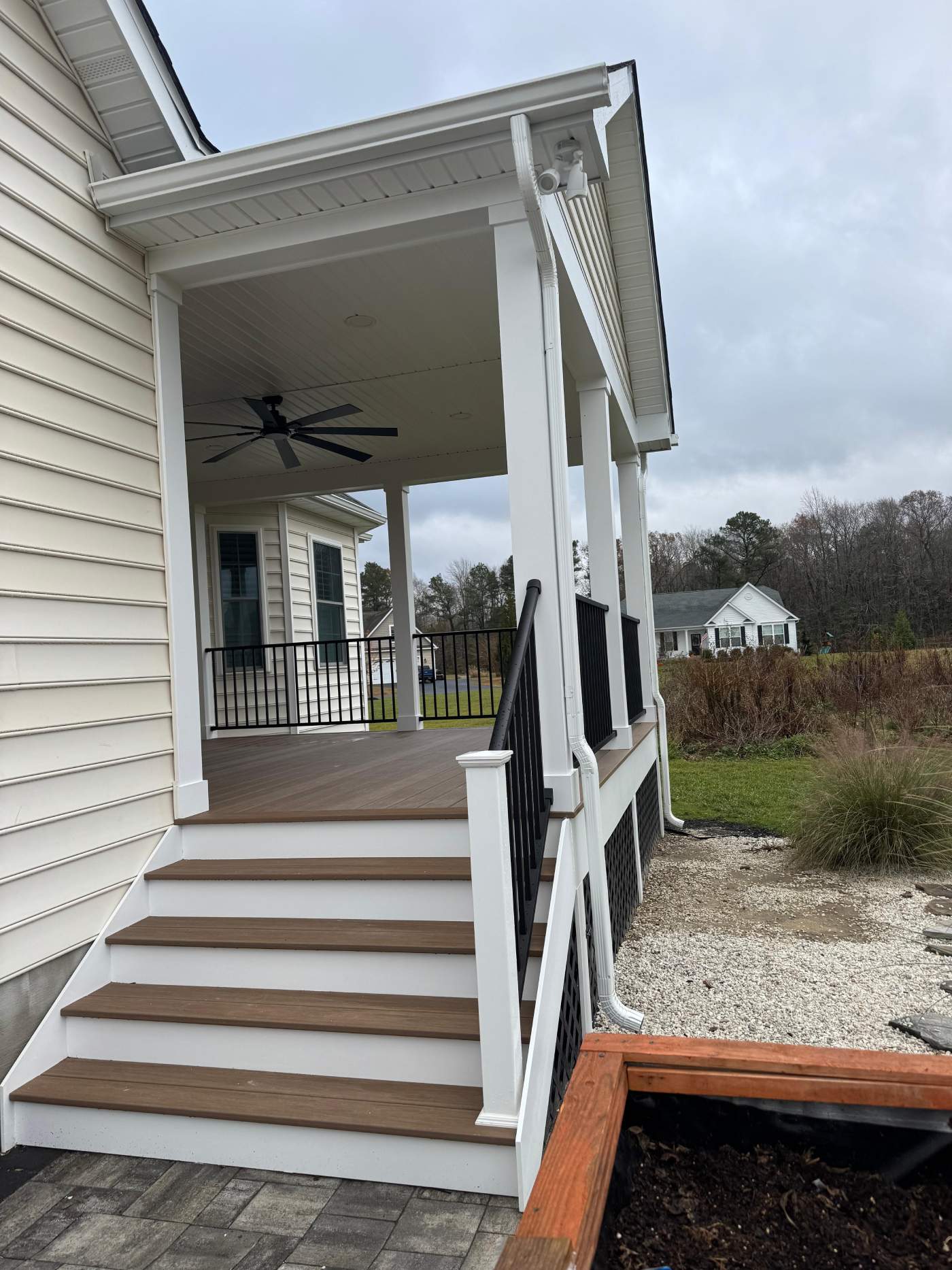 milton-porch-builder-delmarva-decking.jpg Custom Porch built by delmarva decking in Milton, using black aluminum railings