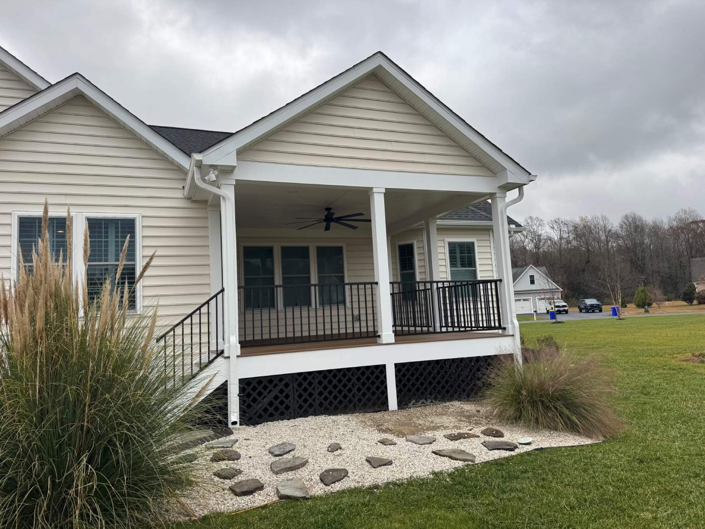 milton-porch-builder-delmarva.jpg Custom Porch built by delmarva decking in Milton, using black lattice as skirting