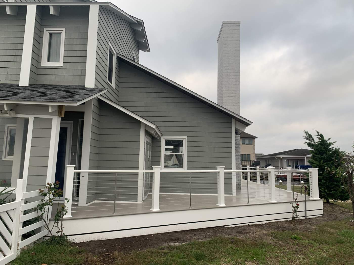rehoboth-beach-deck-cable-railings-delmarva.jpg Rehoboth Beach deck with cable railings built by delmarva decking