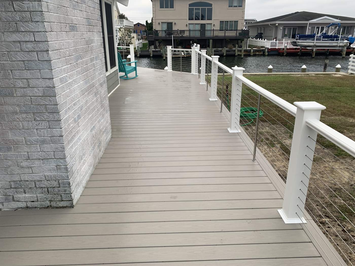 rehoboth-beach-deck-railings-delmarva.jpg Custom Rehoboth Beach deck with cable railings built by delmarva decking